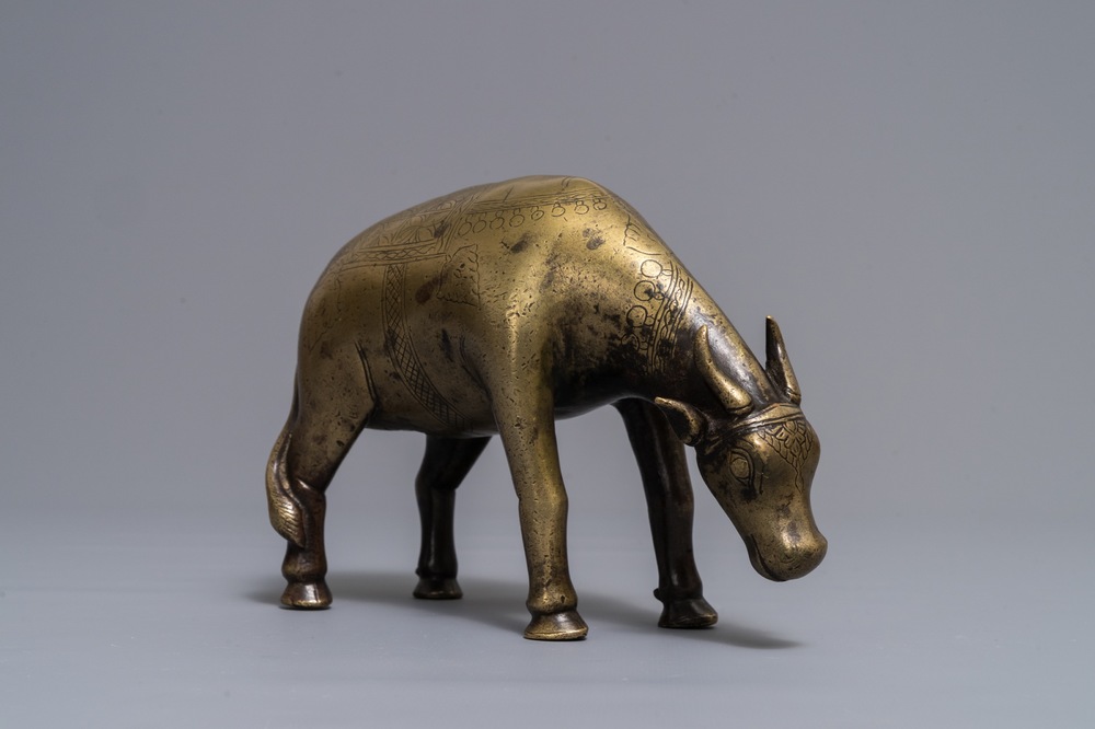 A Mughal brass water-dropper or aquamanile in the form of a zebu, India, 17th/18th C.