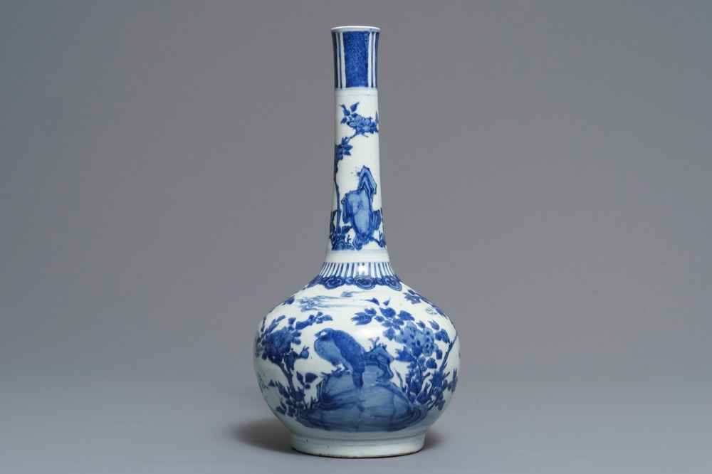 A large Chinese blue and white bottle vase with birds in a landscape, Wanli