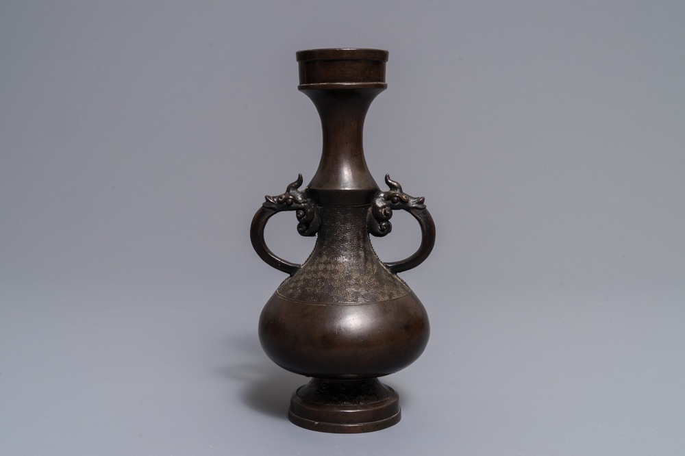 A Chinese bronze relief-decorated vase, Yuan/Ming