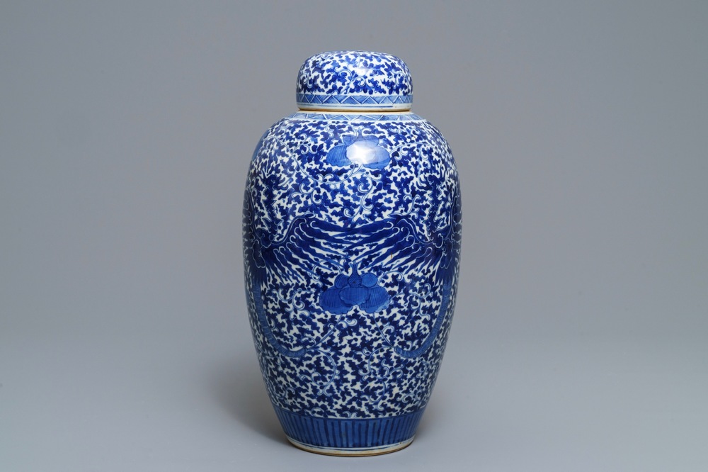 A Chinese blue and white 'phoenix' jar and cover, 19th C.