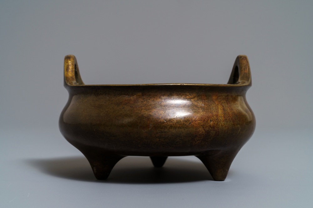 A Chinese bronze tripod censer, Xuande mark, 19th C.