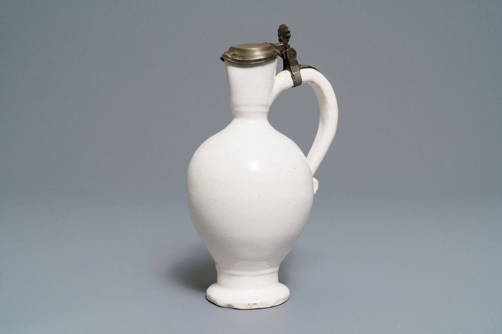 A fine white Dutch Delft jug with pewter cover, 2nd half 17th C.