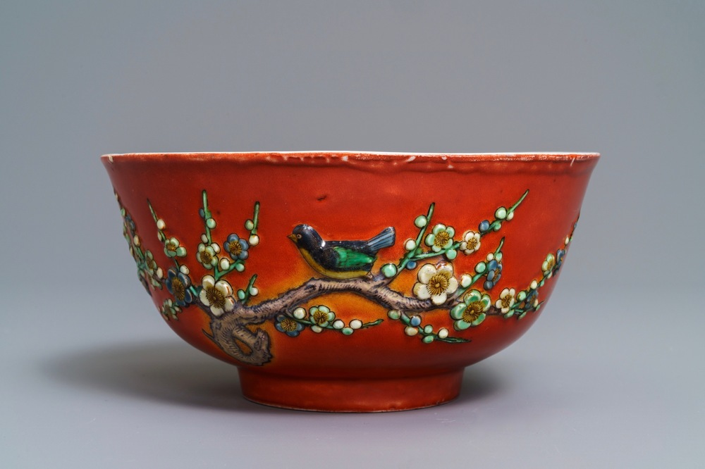 A Chinese coral-red relief-decorated bowl, 19th C.