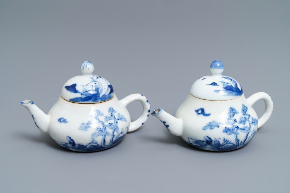 A pair of Chinese blue and white 'Bleu de Hue' Vietnamese market teapots, 19th C.