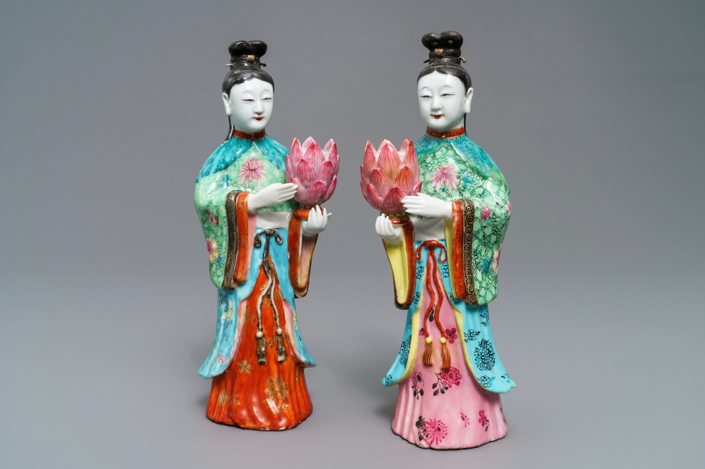 Two Chinese famille rose candle holders modelled as court ladies, Qianlong