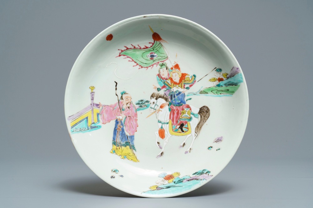 A Chinese famille rose dish with warriors on horseback, Yongzheng