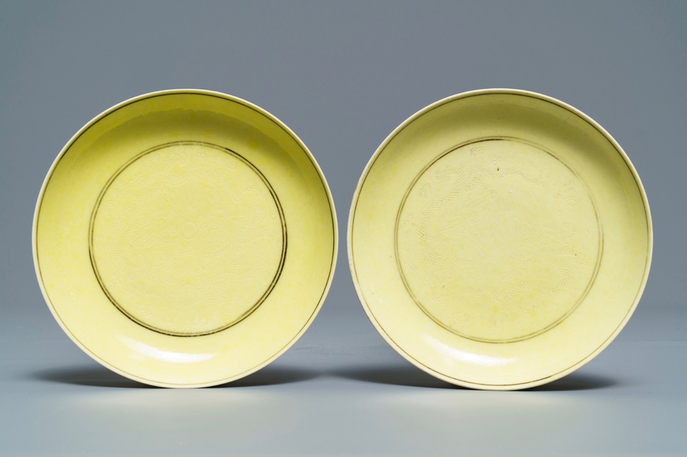 A pair of Chinese monochrome yellow 'dragon' plates, Tongzhi mark and prob. of the period