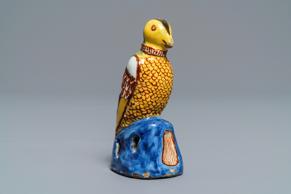 A polychrome Dutch Delft model of a parrot, late 18th C.