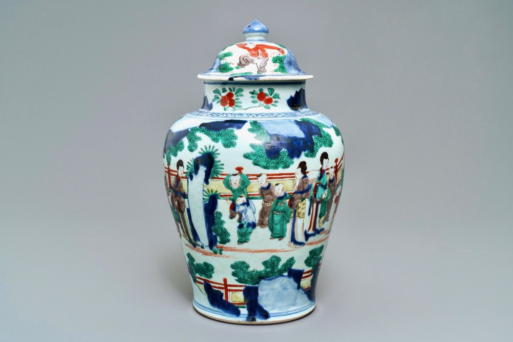 A Chinese wucai baluster vase and cover with playing boys, Transitional period