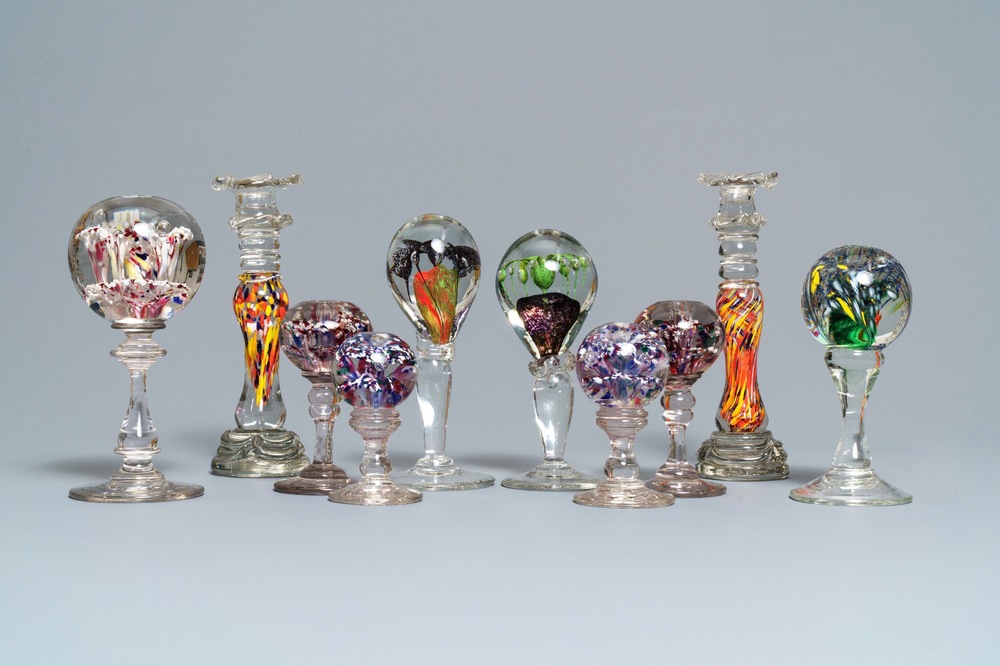 Ten glass paperweights and candlesticks, France, 18/19th C.