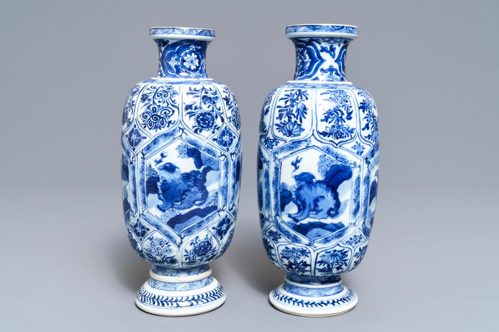 A pair of Chinese blue and white 'mythical beasts' vases, Kangxi