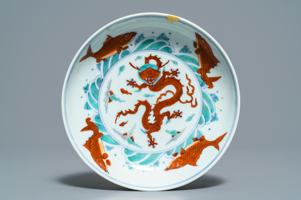 A Chinese doucai 'dragon and carps' plate, Chenghua mark, Yongzheng