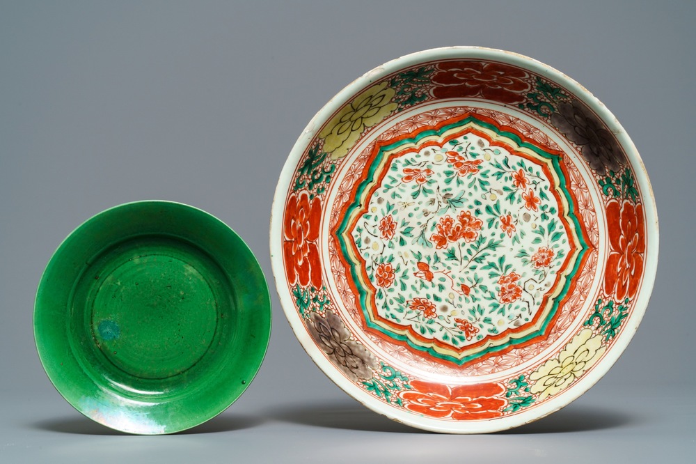 A Chinese famille verte dish and a monochrome green plate, Kangxi