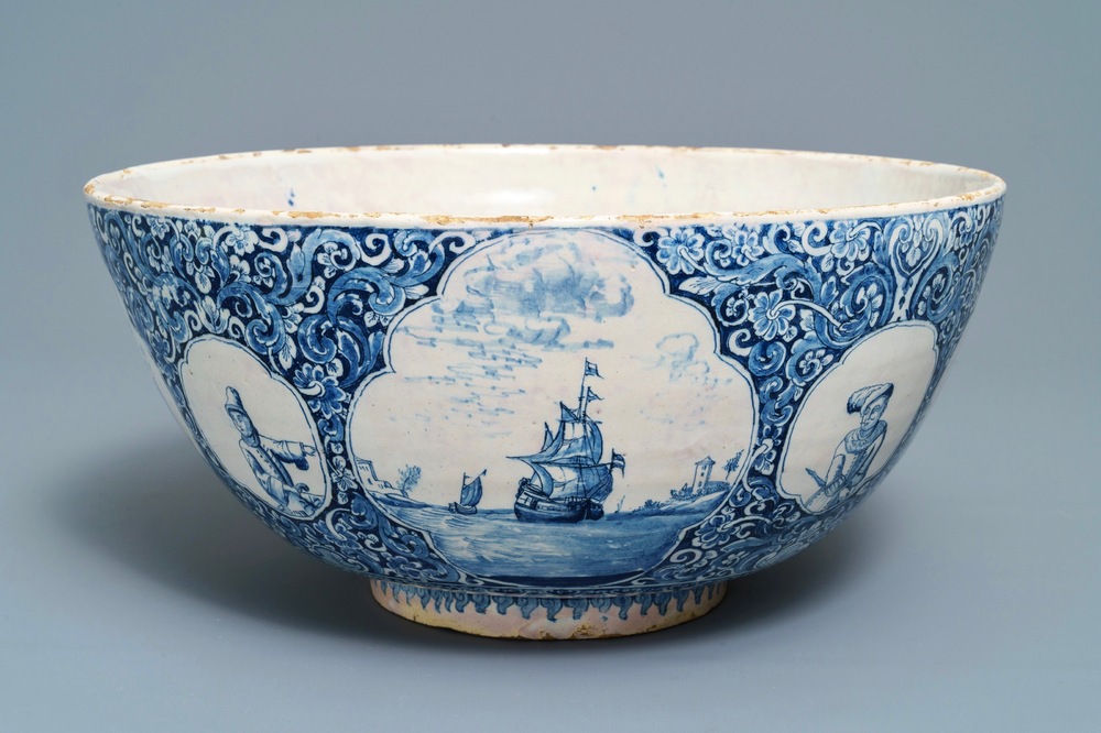 A fine and large Dutch Delft blue and white 'maritime subject' bowl depicting Atlas, 18th C.