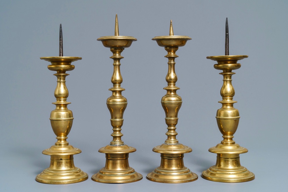 A PAIR OF 17TH CENTURY DUTCH BRASS PRICKET CANDLESTICKS. - EARLY METALWARE
