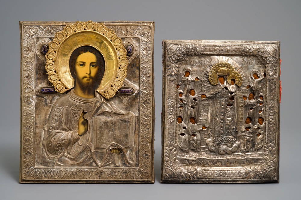 Twee Russische verzilverd koperen oklad of riza iconen: 'Moeder Gods met apostelen' en 'Pantocrator', 19e eeuw