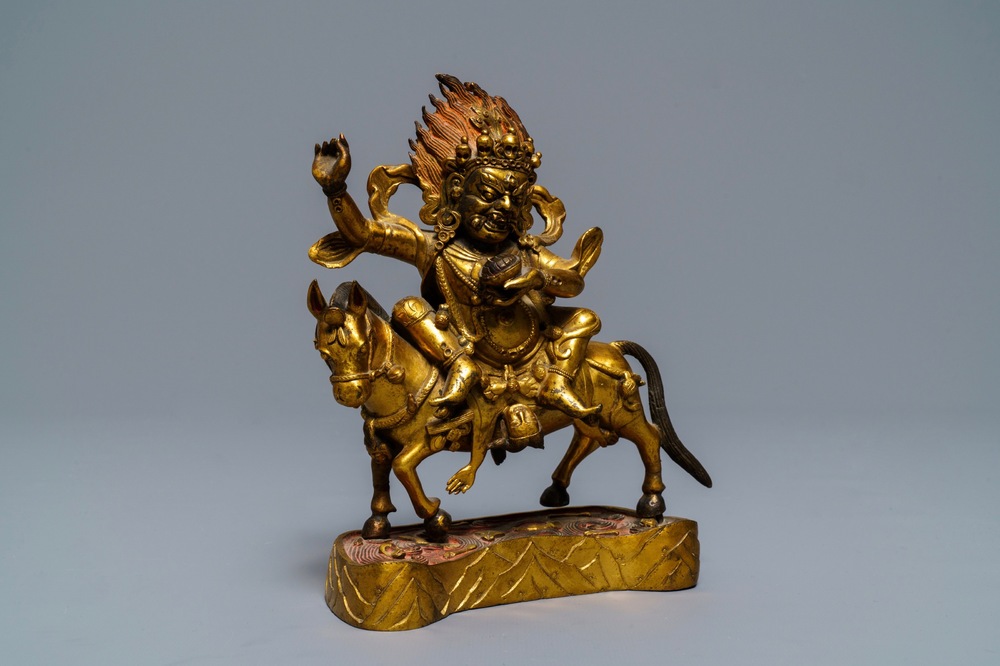 A Tibetan gilt bronze figure of Palden Lhamo, 17th C.