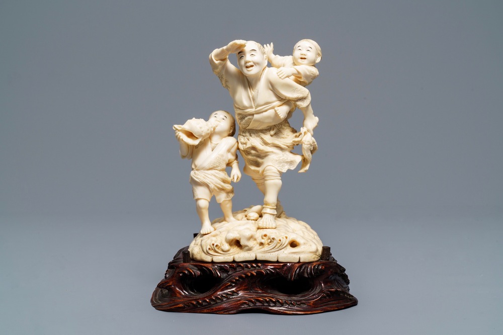 A signed Japanese ivory okimono, Meiji, 19th C.