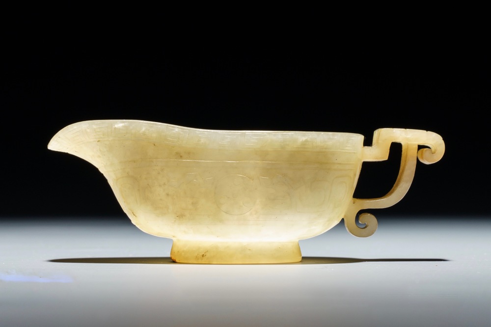 A Chinese pale yellow jade libation cup, 19th C.