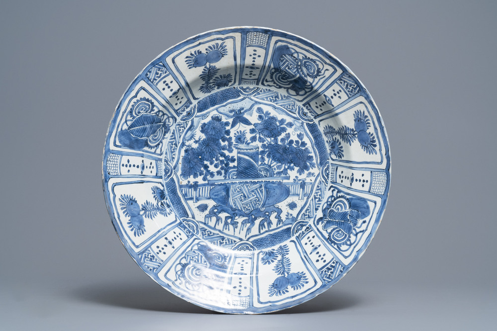 A massive Chinese blue and white kraak porcelain charger with a jardini&egrave;re, Wanli