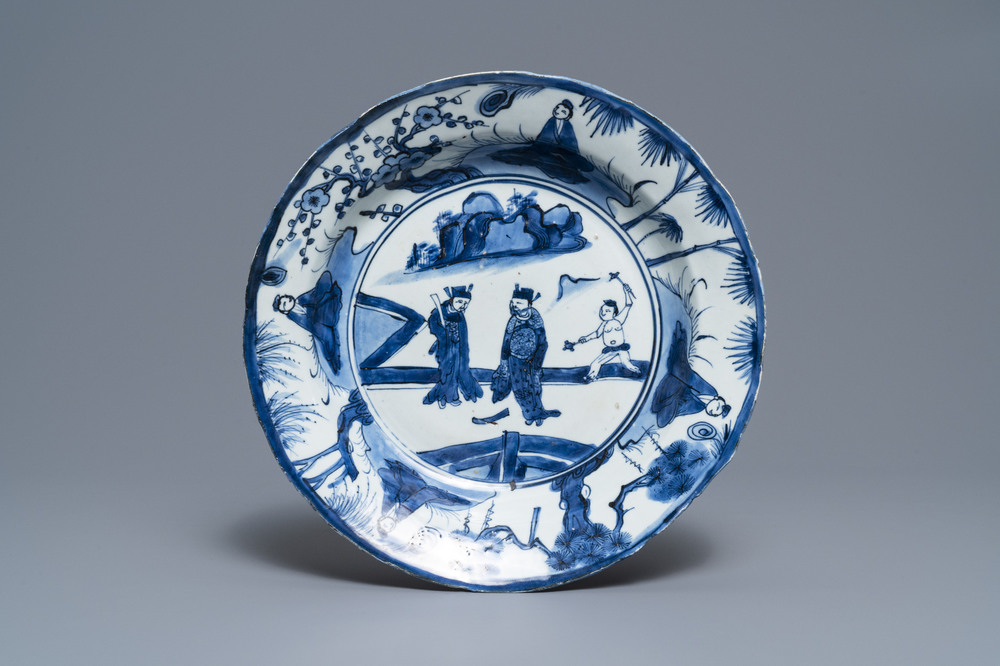 A Chinese blue and white kraak porcelain dish with figures in a landscape, Wanli