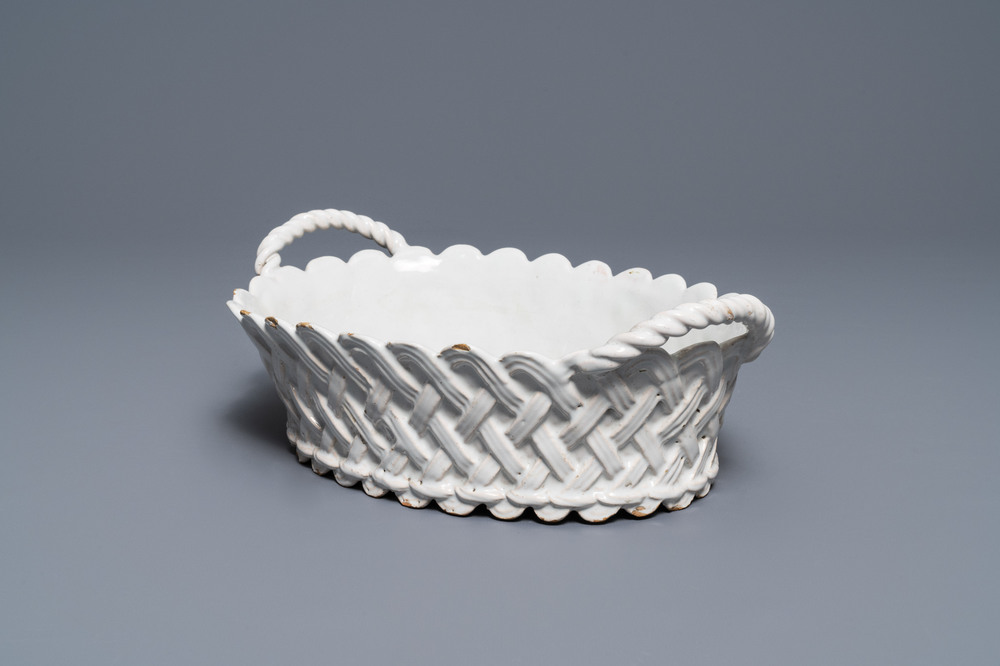 An oval monochrome white Brussels faience basket, 18th C.