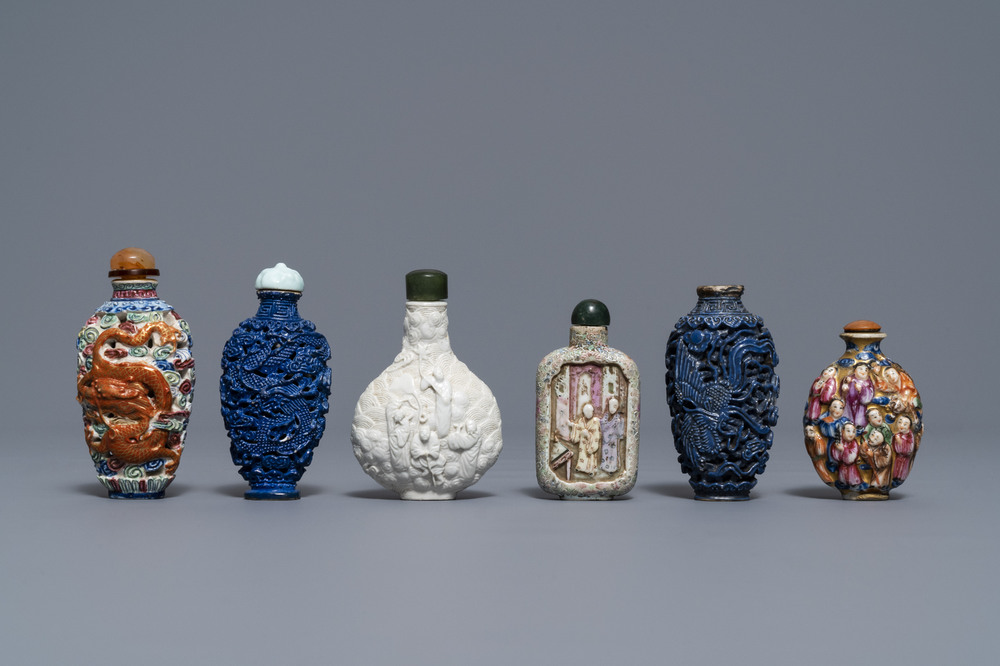 Six Chinese famille rose, blanc de Chine and faux-lapis lazuli relief-decorated snuff bottles, 19/20th C.