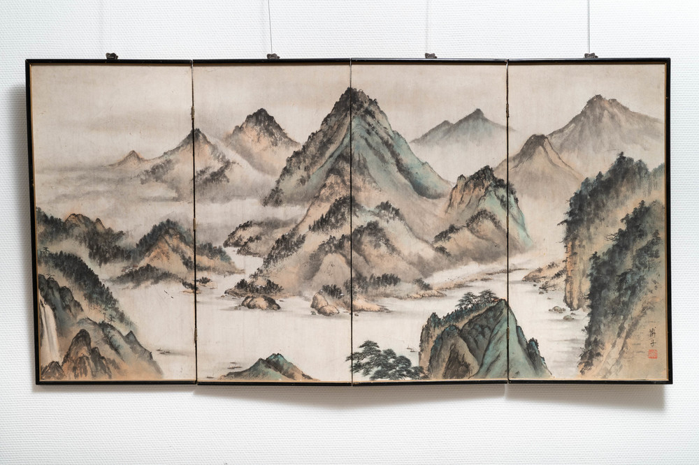 Chinese school, signed Tan Xun, 20th C., ink and colour on paper mounted as screen: 'Mountain landscape'