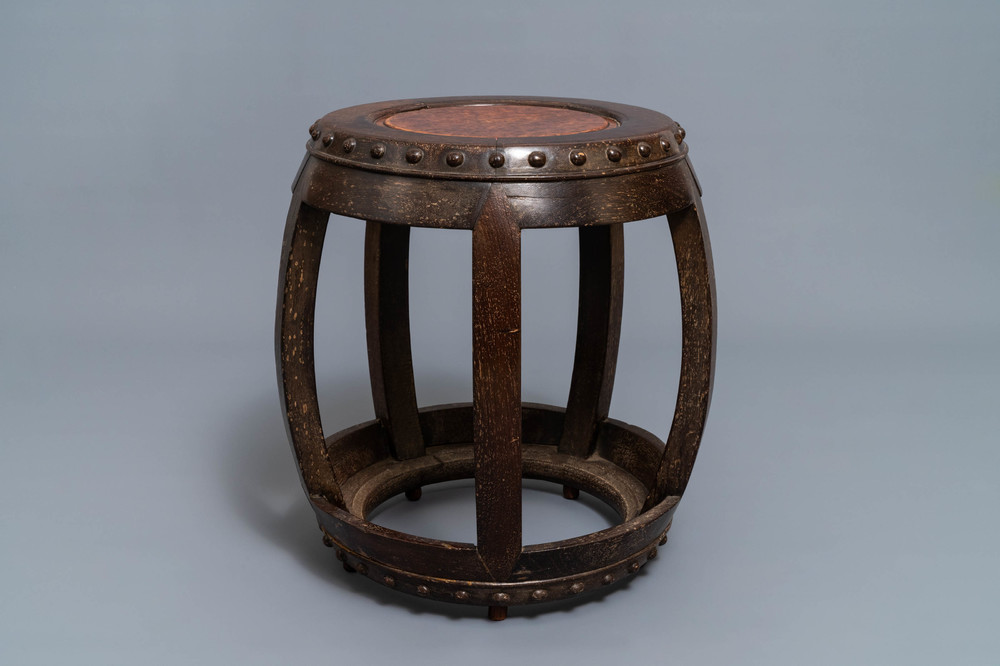 A Chinese carved hardwood stand with rootwood top, 19th C.