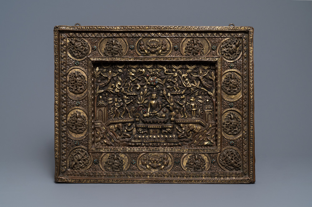 A parcel-gilt coral- and turquoise inlaid bronze votive 'Medicine Buddha' plaque, Tibet or Nepal, 19th C.