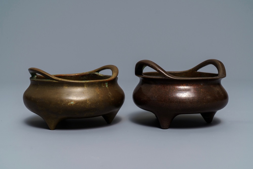 Two Chinese bronze tripod censers, Xuande marks, 19th C.