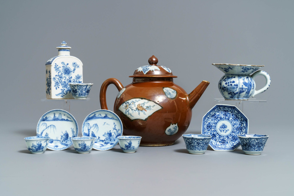 A large Chinese 'capucin' teapot, a blue and white spittoon and various tea wares, Kangxi/Qianlong