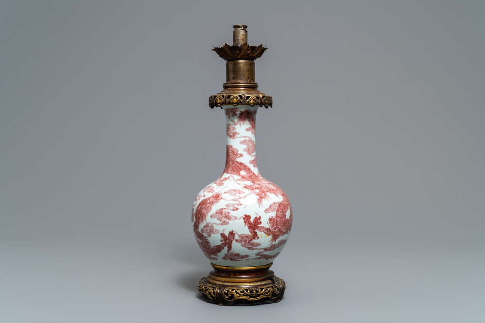 A Chinese underglaze red bottle-shaped 'dragon' vase with gilt-bronze mounts, 18/19th C.