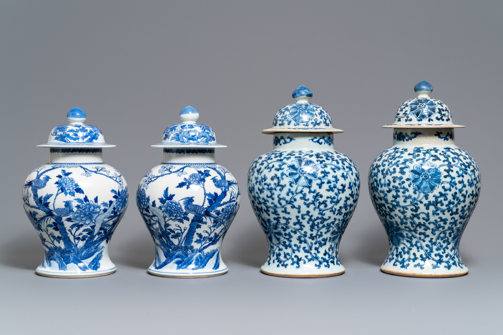 Two pairs of Chinese blue and white vases and covers, Kangxi and Chenghua marks, 19th C.