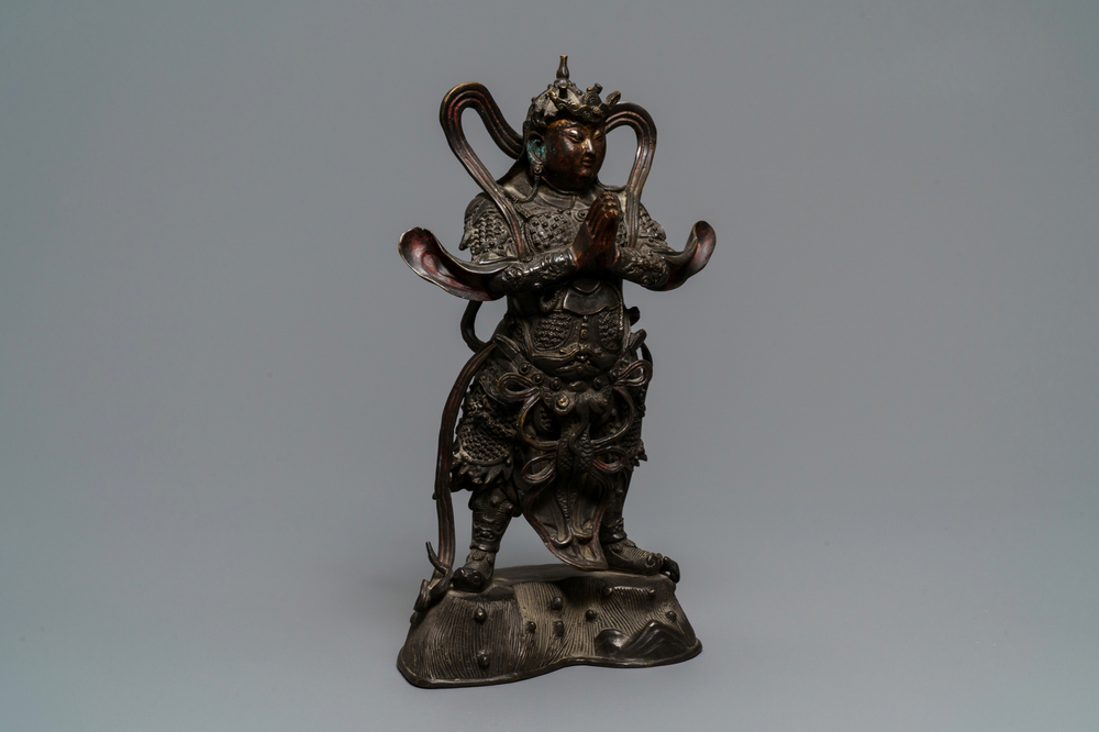 A Chinese gilt-lacquered bronze figure of Weituo, Ming