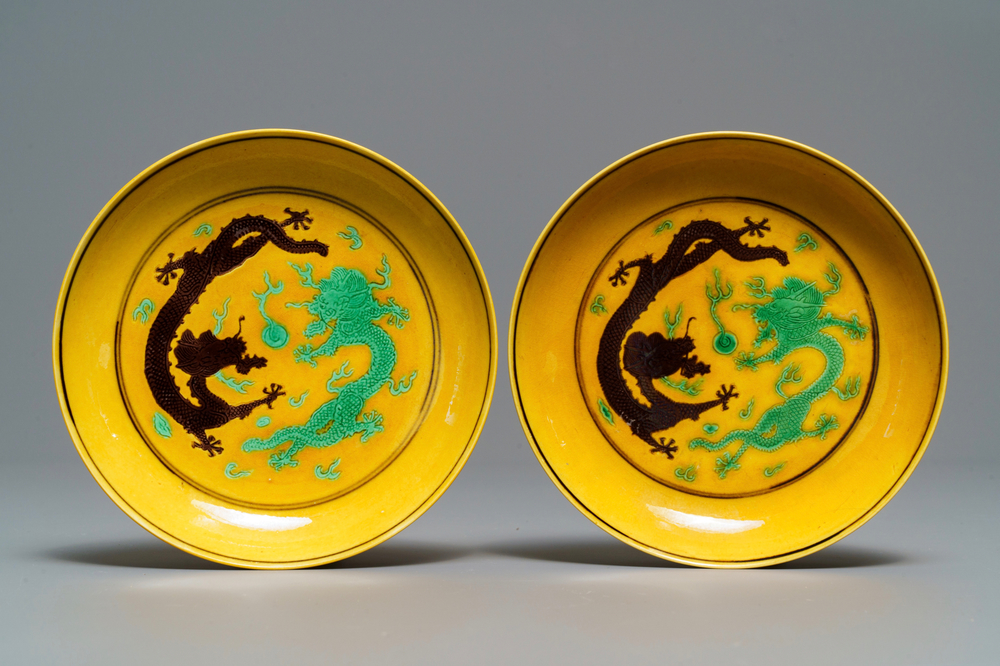 A pair of Chinese yellow-ground green and aubergine 'dragon' dishes, Tongzhi mark and prob. of the period