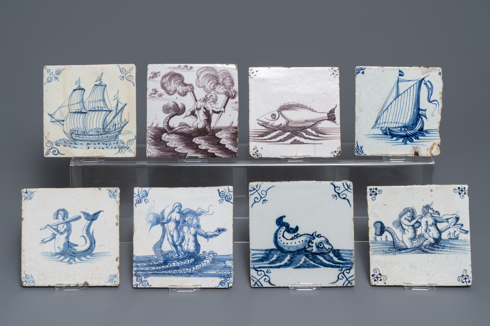 Eight Dutch Delft blue and white and manganese tiles with ships and sea creatures, 17/18th C.