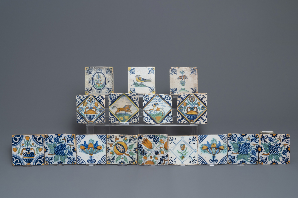 Sixteen polychrome Dutch Delft tiles with birds and flowers, 16/17th C.