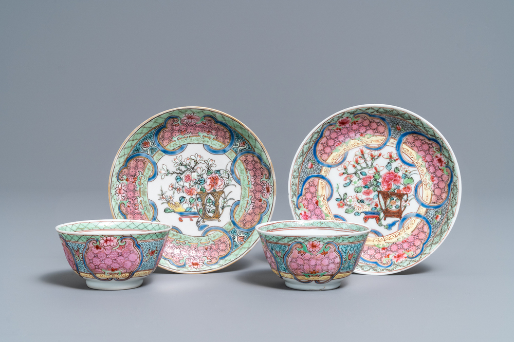 A pair of Chinese famille rose cups and saucers, Yongzheng