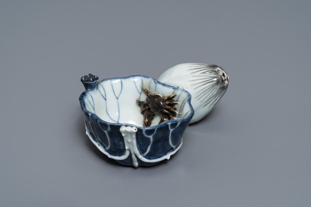 A Chinese underglaze blue and copper-red 'crab and lotus' water dropper, Kangxi