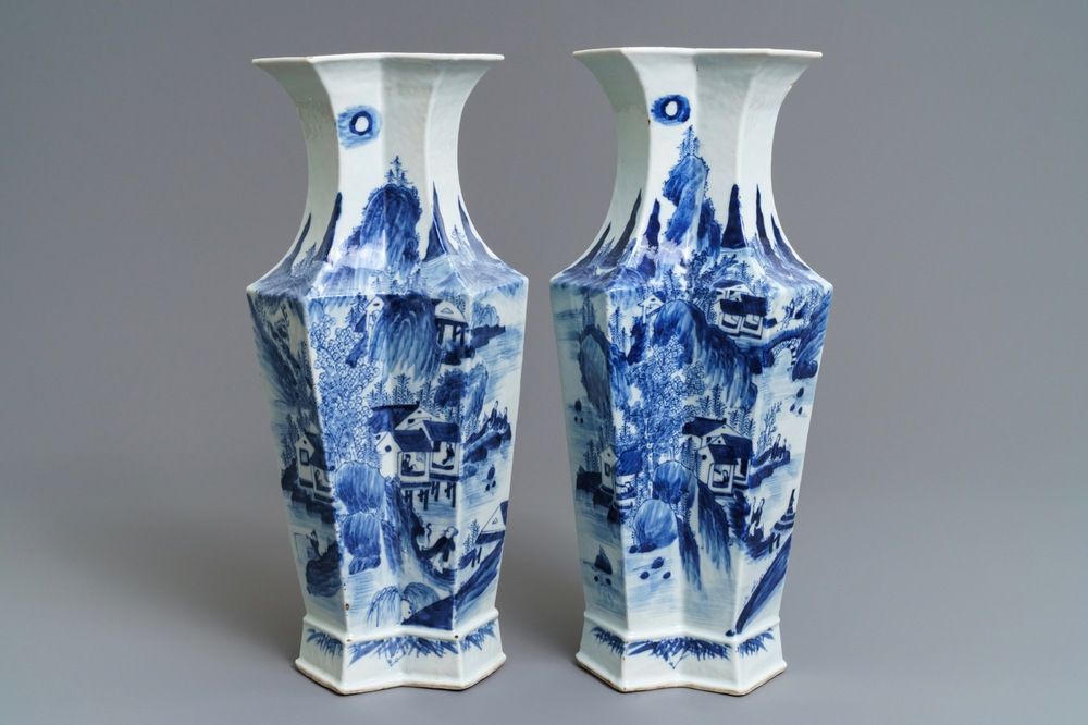 A pair of Chinese blue and white 'landscape and calligraphy' vases, 19th C.