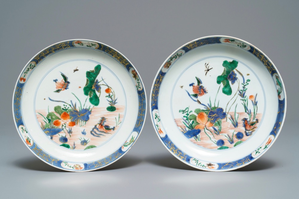 A pair of Chinese famille verte 'ducks in a lotus pond' plates, Kangxi