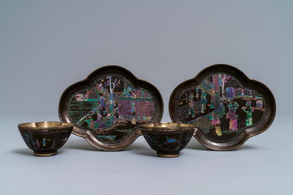 A pair of Chinese silver and lac burgaut&eacute; quatrefoil cups and saucers, Kangxi