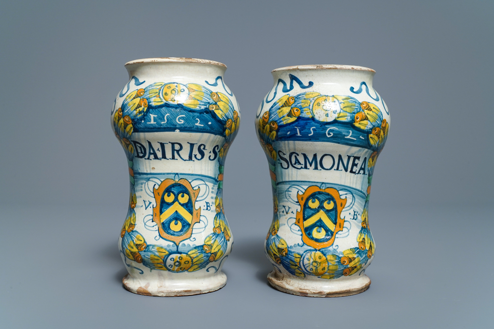 A pair of Italian maiolica armorial albarelli, Deruta, dated 1562