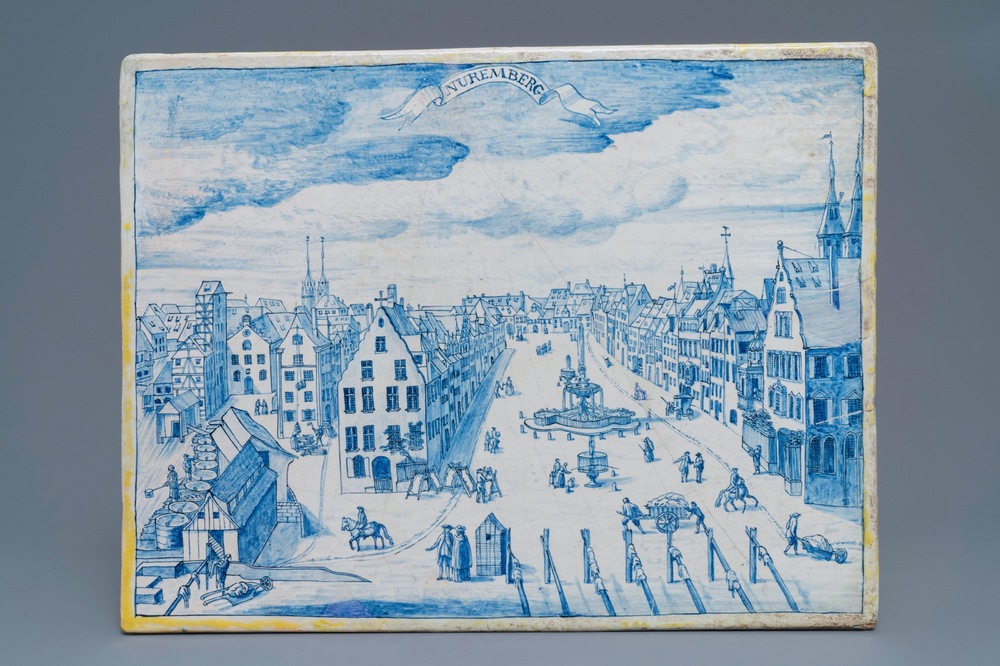 Een rechthoekige blauw-witte Delftse plaquette met zicht op Neurenberg, 18e eeuw