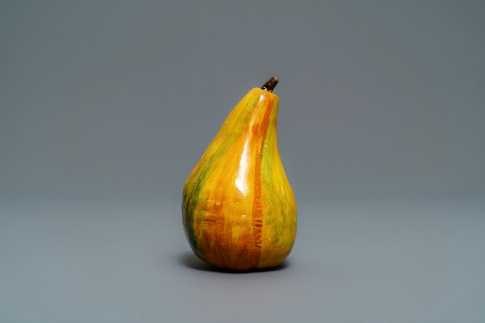 A polychrome Dutch Delft model of a pear, 18th C.