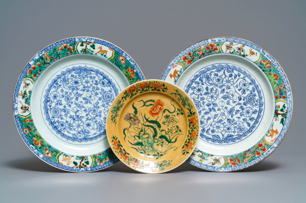 A pair of Chinese famille verte dishes and a caf&eacute;-au-lait-ground plate, Kangxi