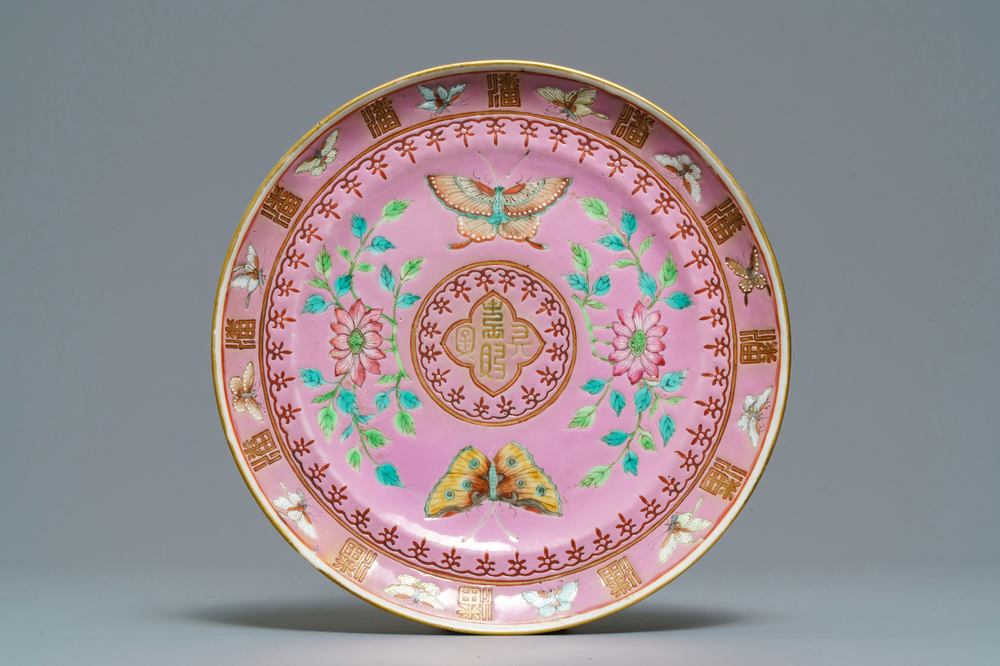 A Chinese pink-ground famille rose Pan family Straits market plate, Guangxu mark, 19th C.