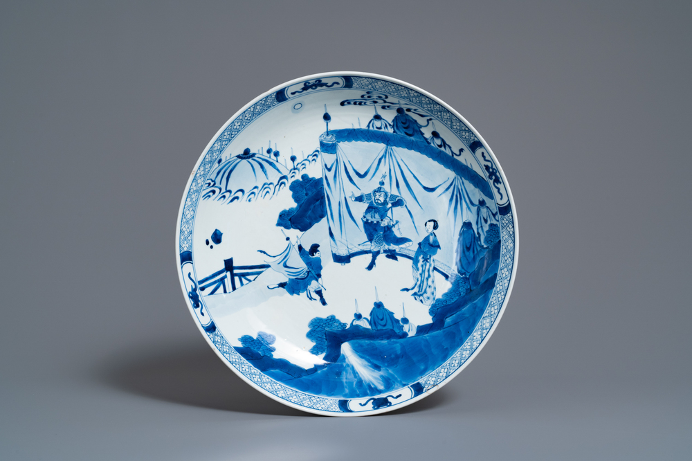 A Chinese blue and white dish with a narrative scene, Kangxi