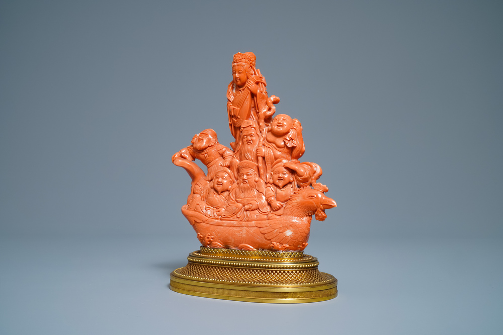 A Japanese carved red coral group of the seven lucky gods on a phoenix boat, Meiji, 19th C.